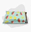 teal poly mailer with watermelon and lemon pattern